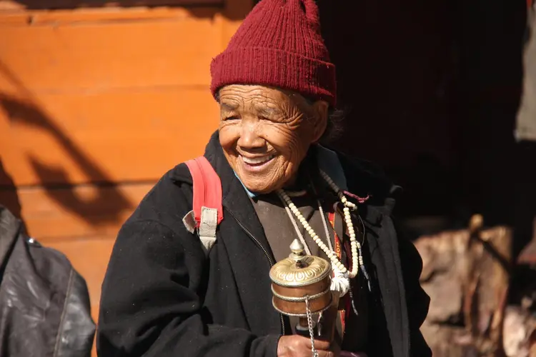 Ladaksma with prayer wheel